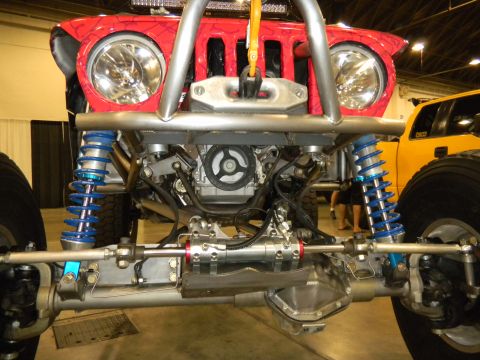 1997 Ford Ranger - Custom off-road vehicle with a red grille and exposed engine components is displayed.