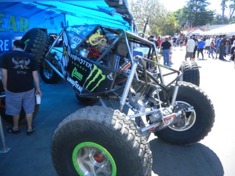 1997 Ford Ranger - Custom off-road buggy displayed at an event, extensive sponsorship decals.
