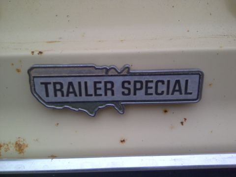 1979 Ford E250 - Close-up of a 'Trailer Special' badge, indicating a specific trim or package on a vehicle.