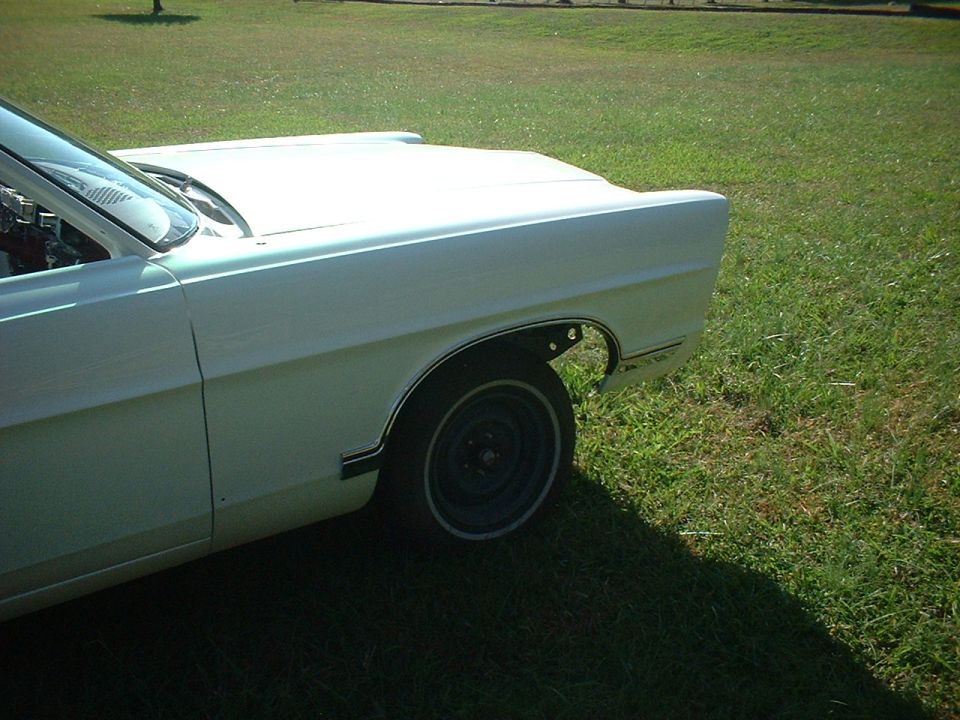 1967 Ford Galaxie side view showing front fender and wheel