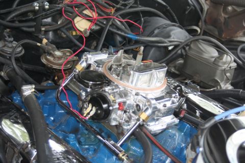1976 Ford Ranchero - Engine bay detail showing a carburetor and associated engine components.