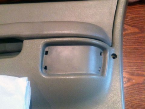 2001 Mercury Grand Marquis - This photo shows a section of a car's interior door panel, likely where a courtesy light would be installed.