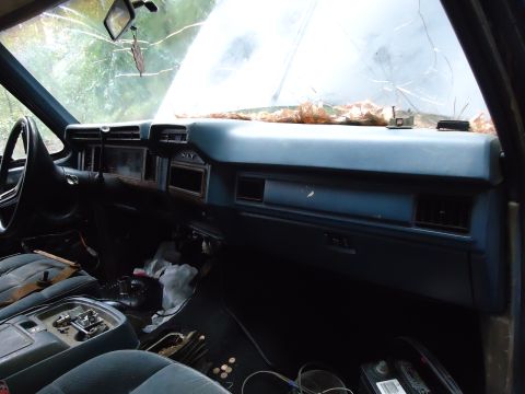 1985 Ford Bronco - Interior view of a 1985 Ford Bronco, showing the dashboard and seats.