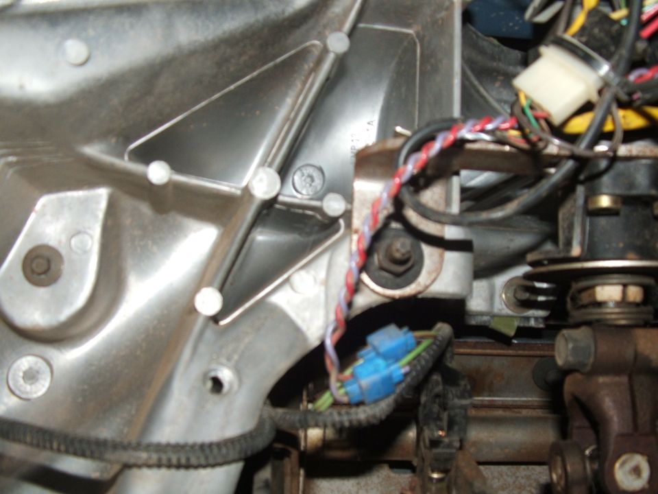 Wiring harness with blue connectors and metal casing