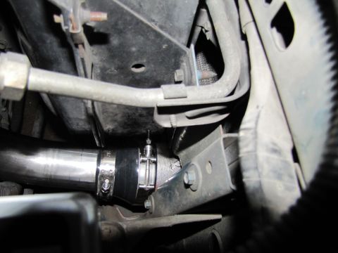 1993 Ford F-250 - Underside view of engine bay components, including metal piping and hoses, with a visible watermark.