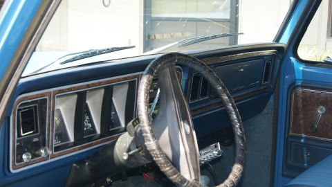 1978 Ford Bronco - Interior view of a 1978 Ford Bronco, highlighting the dashboard and steering wheel.