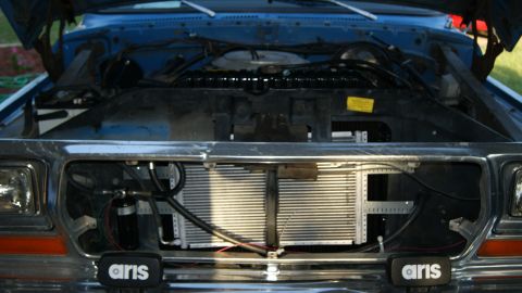1978 Ford Bronco - Front view of the engine bay of a 1978 Ford Bronco, showing the radiator and various engine components.
