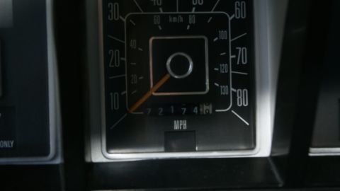1978 Ford Bronco - Close-up of the dashboard gauges, showing the speedometer and odometer readings.
