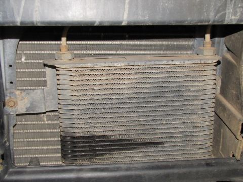 1995 Ford Bronco - This transmission cooler is part of a vehicle's cooling system, likely mounted in front of the main radiator.