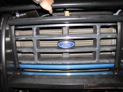 1993 Ford F-250 - Close-up of the front grille of a 1993 Ford F-250, revealing the intercooler system.