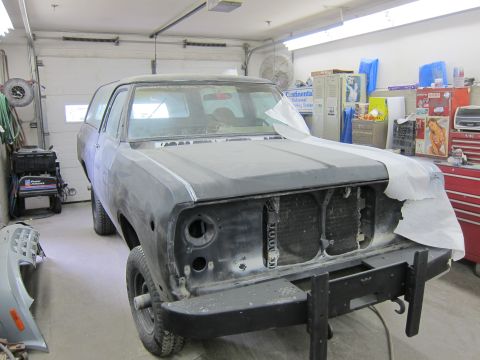 1987 Dodge 1500 - This 1987 Dodge 1500 is undergoing bodywork in a garage setting.