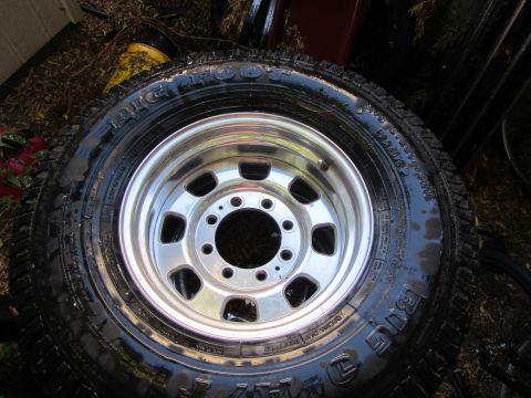 1987 Suzuki Samurai - A tire and rim are shown, with "BIGFOOT" visible on the tire's sidewall.