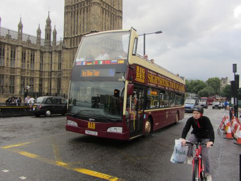 1968 Ford Mustang - A double-decker Big Bus Tours vehicle is seen in London, with the Houses of Parliament in the background.