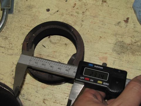 1993 Ford F-250 - Measuring a metal ring with digital calipers. The reading is 2.314 inches.