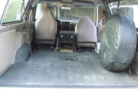 1996 Ford Bronco - The interior of an SUV is shown, with a focus on the seating and cargo space.