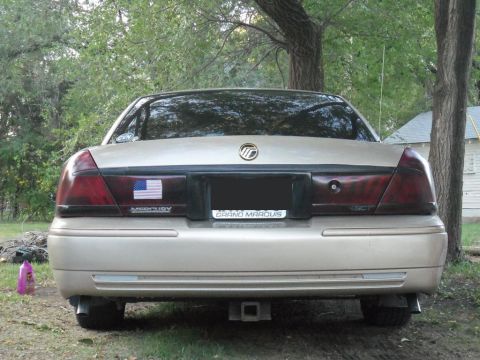2000 Mercury Grand Marquis - Rear view of a 2000 Mercury Grand Marquis, showing the taillights and trunk lid.