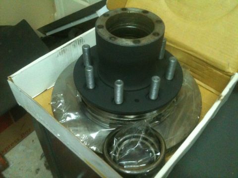 1992 Jeep YJ - Wheel hub and brake rotor assembly, likely for a truck or heavy-duty vehicle, shown in its packaging.