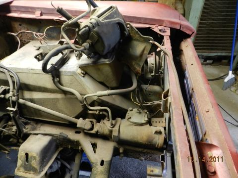1978 Ford Bronco - Close-up of the engine bay, focusing on the steering and brake system components.