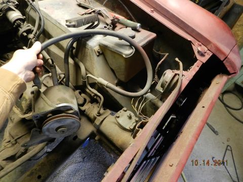 1978 Ford Bronco - Engine bay detail with power steering pump and associated hoses visible.