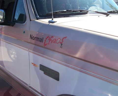 1996 Ford Bronco - Side view of a 1996 Ford Bronco XLT a custom 'Normal Chaos' decal.