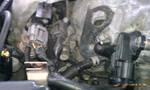1994 Ford Probe - Engine bay detail showing electrical connectors and fuel system components.