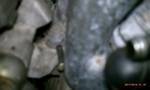 1994 Ford Probe - Detail shot of an engine component, showing texture and metallic elements.