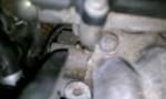 1994 Ford Probe - Engine compartment detail showing various parts and connections.