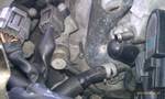 1994 Ford Probe - A detailed view of various engine components and plumbing, likely from a vehicle's engine bay.