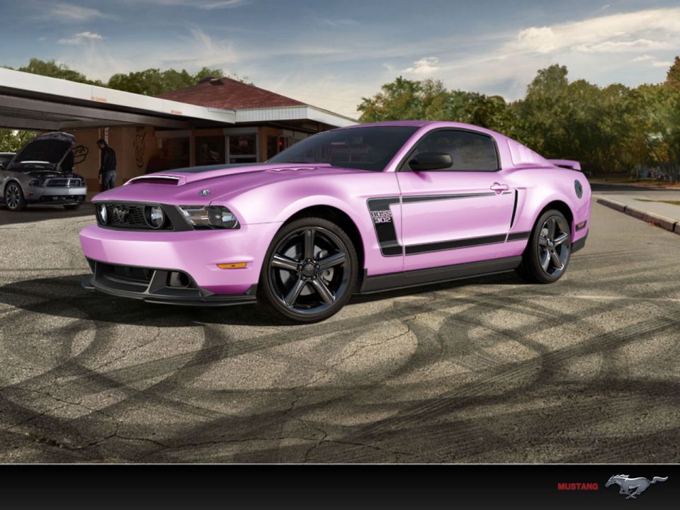 Pink 2012 Ford Mustang Boss 302 with black racing stripes and wheels