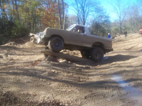 1989 Ford Bronco - This 1989 Ford Bronco navigates a challenging off-road course with a lifted suspension and aggressive tires.