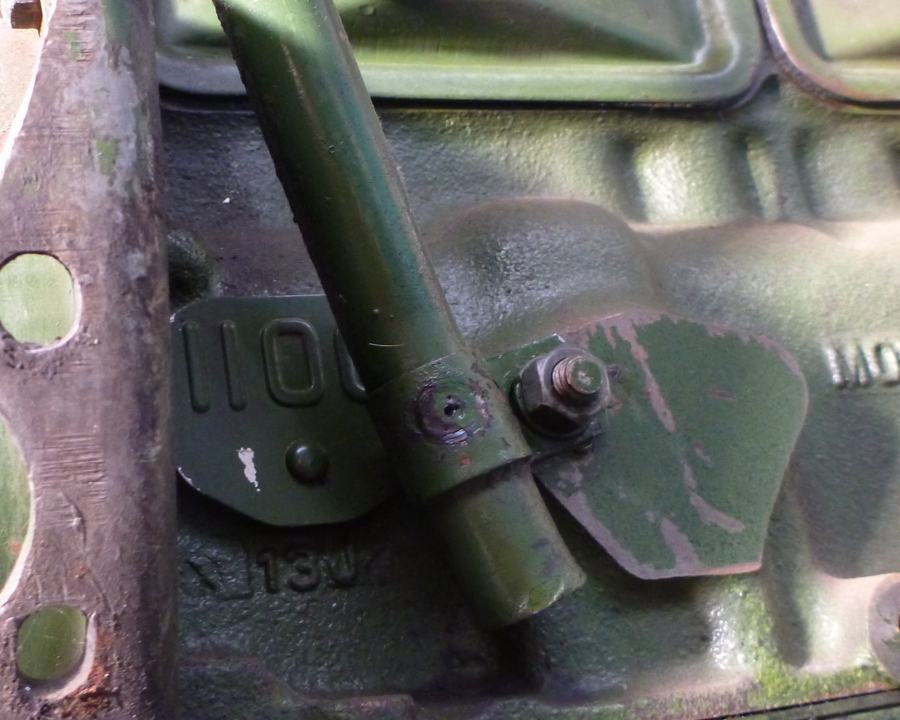 Green engine block with casting numbers 110011 and 130