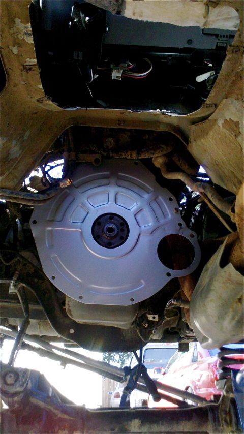 1995 Ford F-150 - Transmission bell housing assembly, likely from a truck or heavy vehicle.