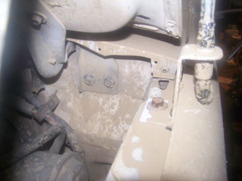1989 Ford Bronco - Undercarriage view showing suspension mounting points and electrical wiring.