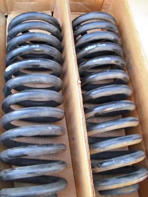 1986 Ford Bronco - Two sets of Eibach suspension springs are shown inside cardboard boxes.