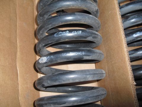 1986 Ford Bronco - Close-up of Eibach springs, possibly for a Bronco, dated 2/97.