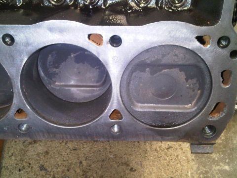 1985 Ford Bronco - This image shows the internal components of an engine, specifically two cylinders and pistons within the engine block.