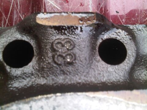 1985 Ford Bronco - Engine part with casting numbers 38 visible. Likely from a 1988 vehicle.
