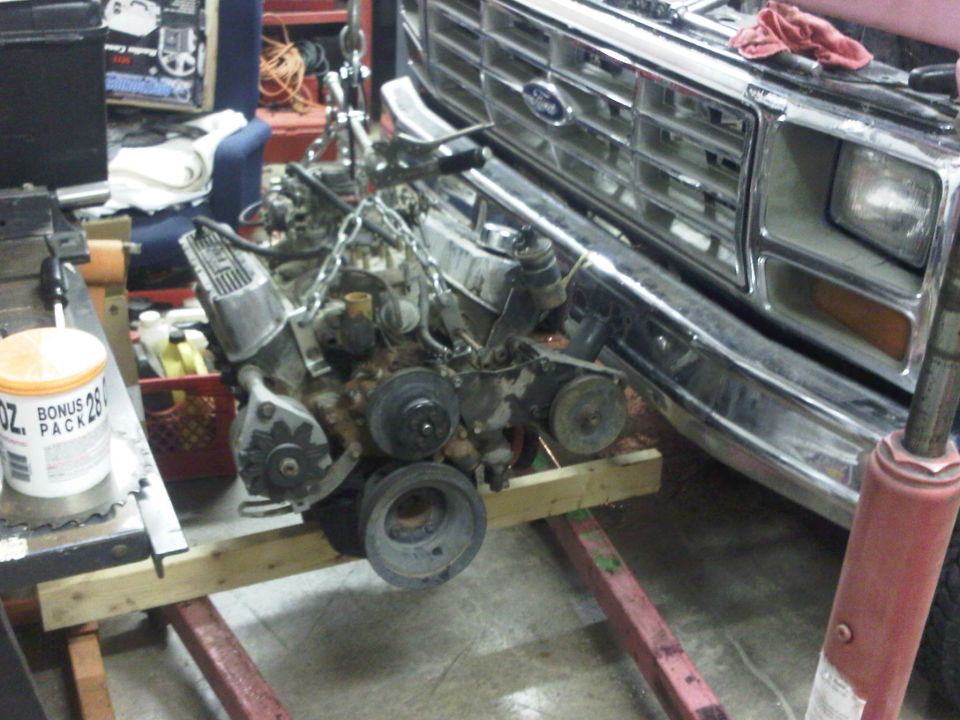 Engine removed from 1980s Ford truck grille
