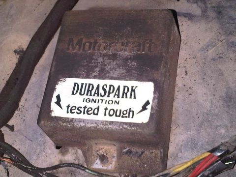 1985 Ford Bronco - A Motorcraft Duraspark ignition module is shown with attached wiring and a "tested tough" sticker.