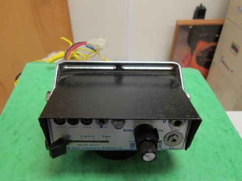 2001 Ford Crown Victoria - Control box for a police scanner unit, likely for emergency vehicle equipment.