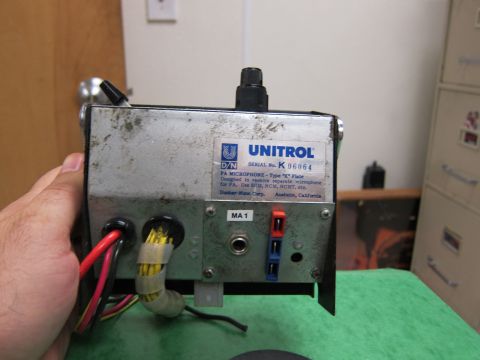 2001 Ford Crown Victoria - Close-up of a Unitrol PA microphone unit, displaying its model and serial number.