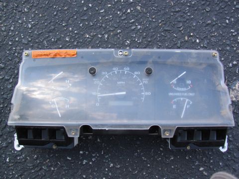 1995 Ford Bronco - Instrument cluster from a 1995 Ford Bronco, showing gauges and mileage.