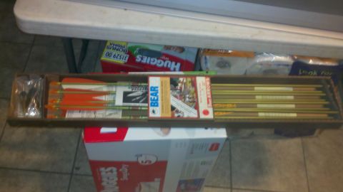 2010 Champion 188 - Box of Bear brand arrows with orange fletching and yellow shafts is visible.