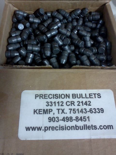1996 Ford Bronco - A box filled with numerous bullets is shown, with a label indicating 'PRECISION BULLETS' and contact information.