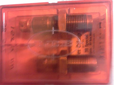 1996 Ford Bronco - A set of reloading dies for 38 Special cartridges is shown inside a red plastic case.