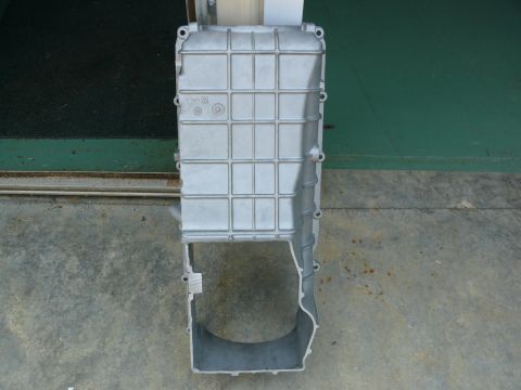 1976 Chevrolet Corvette - Aluminum oil pan with a grid pattern and a large cutout at the bottom.
