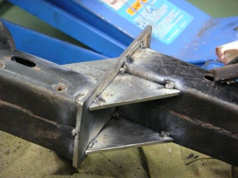 1976 Chevrolet Corvette - Close-up view of a welded metal frame component, showing the details of the fabrication work.