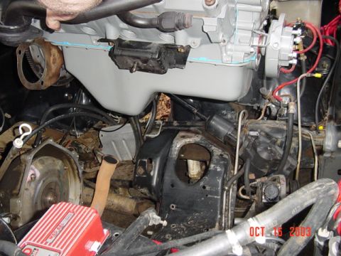 1989 Ford Bronco - And back down into the bay...(we lifted the engine, then rolled the truck under...seemed safer, lift seemed tippy lifted soo high)