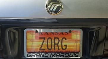 2000 Mercury Grand Marquis - Rear view of a 2000 Mercury Grand Marquis, showing the emblem and Kansas license plate.