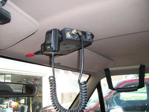 1996 Ford Bronco - Interior view of a vehicle's ceiling-mounted CB radio and microphone.